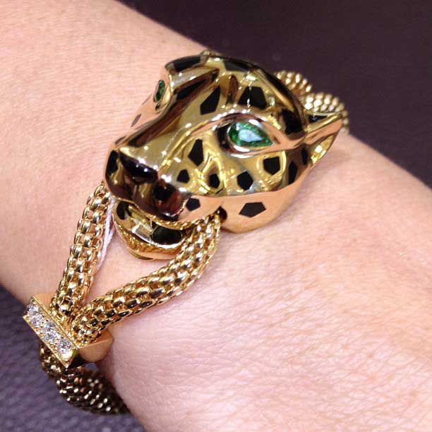 Bracciale d'oro di Cartier con diamanti e smeraldi 