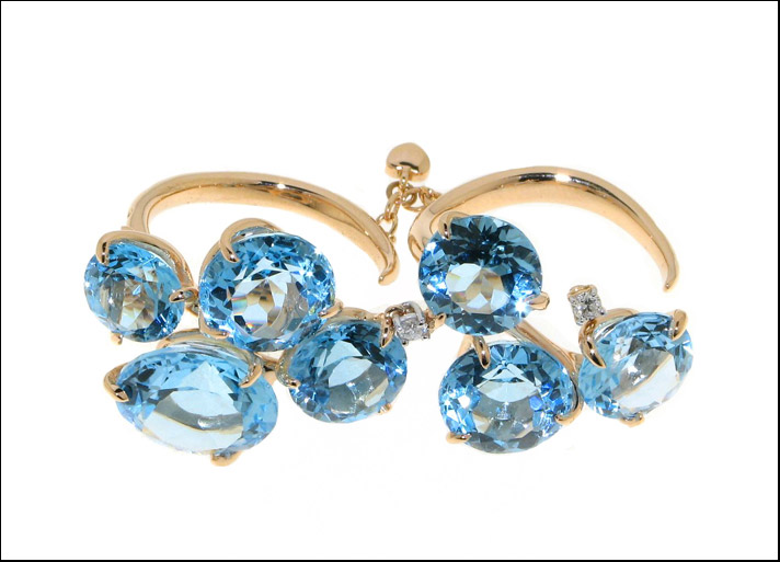 Rio, anello doppio in oro rosa 18 carati con  topazio azzurro e diamanti