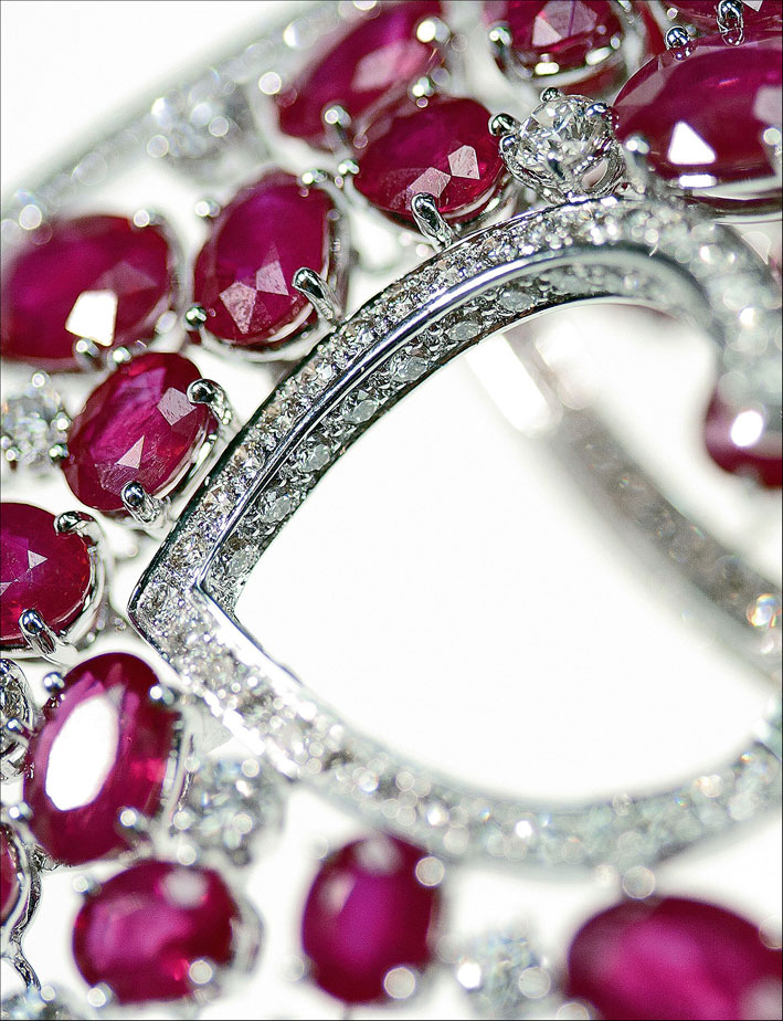 Pair of ruby and diamond ear clips (detail). 2001