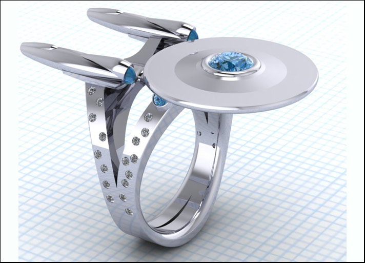Enterpise: anello in argento, oro, zaffiri, rubini e smeraldi sintetici o naturali. Prezzi: a partire da 540 euro
