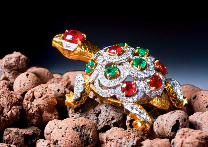 Turtle brooch. Cartier. Set with emeralds, rubies and diamonds, mounted in platinum and 18ct gold signed Cartier Paris, and numbered Paris, circa 1960