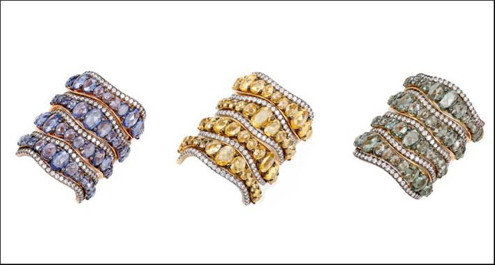 Tre anelli con diamanti colorati