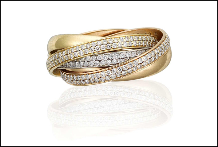 Il classico Trinity di Cartier, in oro e diamanti. È nato nel 1924 ed è ancora prodotto