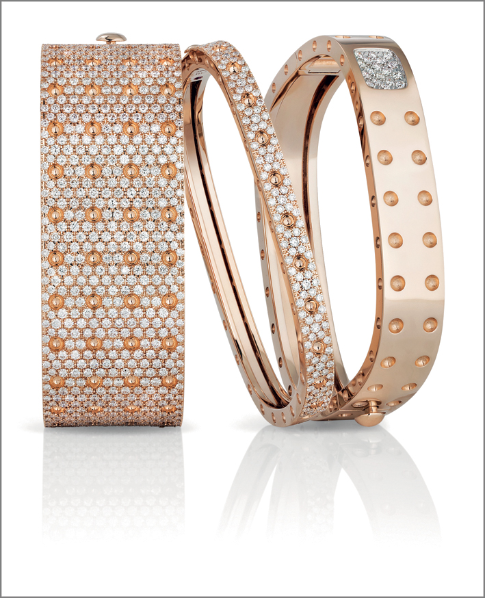 Rose gold bangles with white diamonds