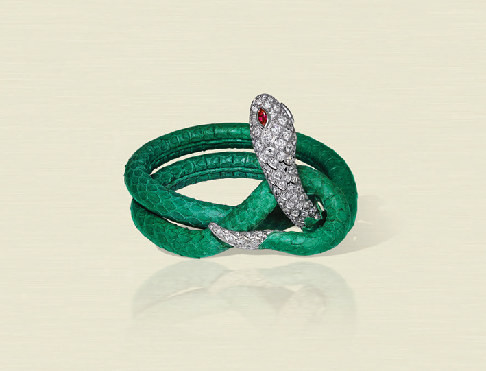 Bracciale in oro bianco, diamanti, rubini taglio marquise, pelle di serpente verde, acciaio