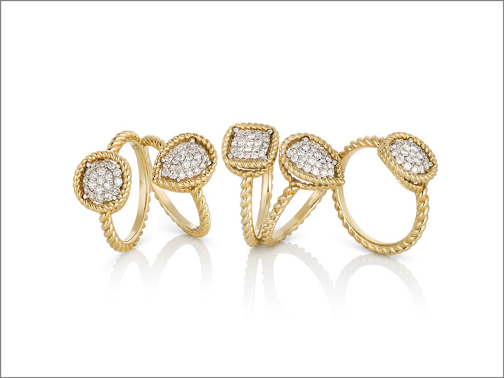 Yellow gold rings with colorless diamonds