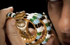 Bulgaris 1967 snake bracelet watch made of gold and polychrome enamel and emeralds.