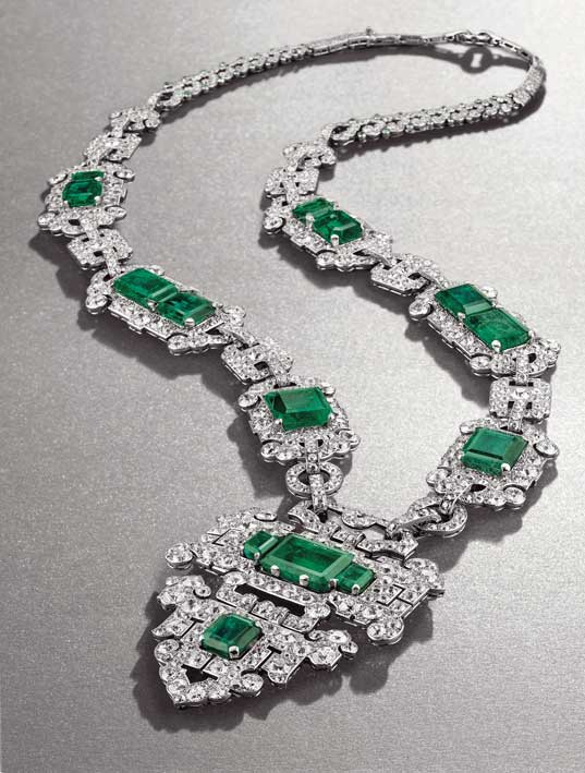 AN ART DECO EMERALD AND DIAMOND SAUTOIR BY CARTIER