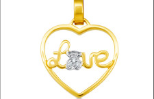 Tous, ciondolo in oro giallo a forma di cuore con scritta Love e O a forma di orsetto con diamanti