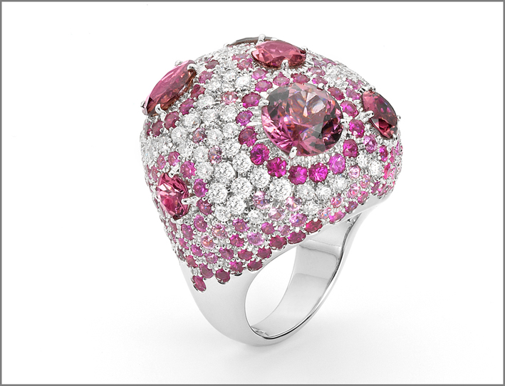 White gold ring with diamonds, pink sapphires and tourmaline