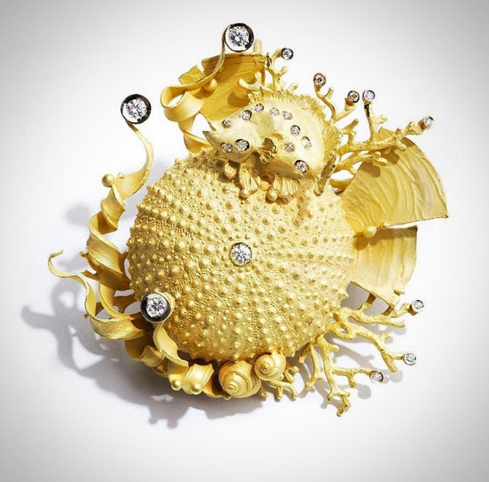 Golden sea urchin shell with diamonds