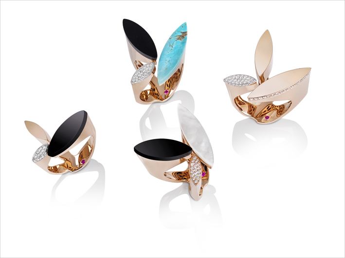 Open rings in rose and white gold with black jade, turquoise, mother of pearl, diamonds and diamond pavé