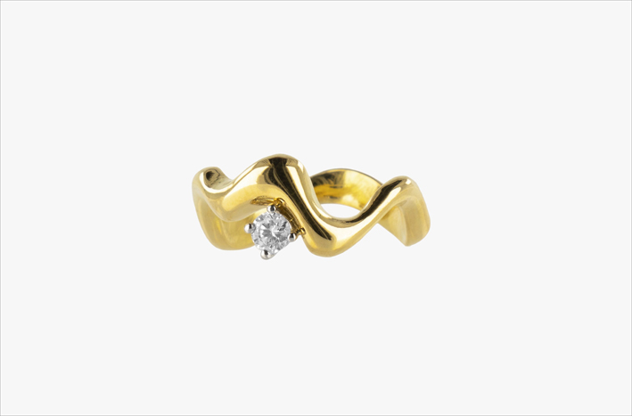 Anello curvo in oro 18 carati e diamante