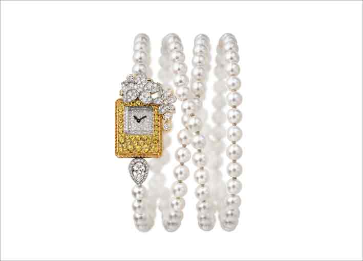 Bracciale-orologio in oro e perle 