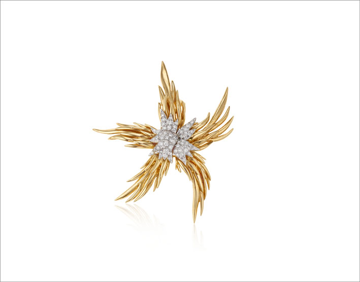 Spilla a forma di stella fiammeggiante in oro 18 carati e diamanti, Jean Schlumberger per Tiffany 
