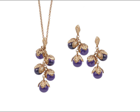 Collana e orecchini in argento dorato e cristalli viola