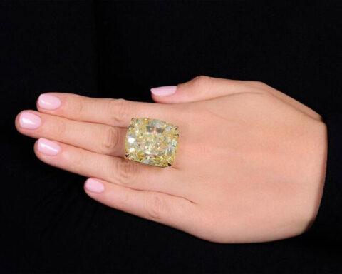 The Love Stone, Highly Important Fancy Intense Yellow diamond ring, 103.62 carats